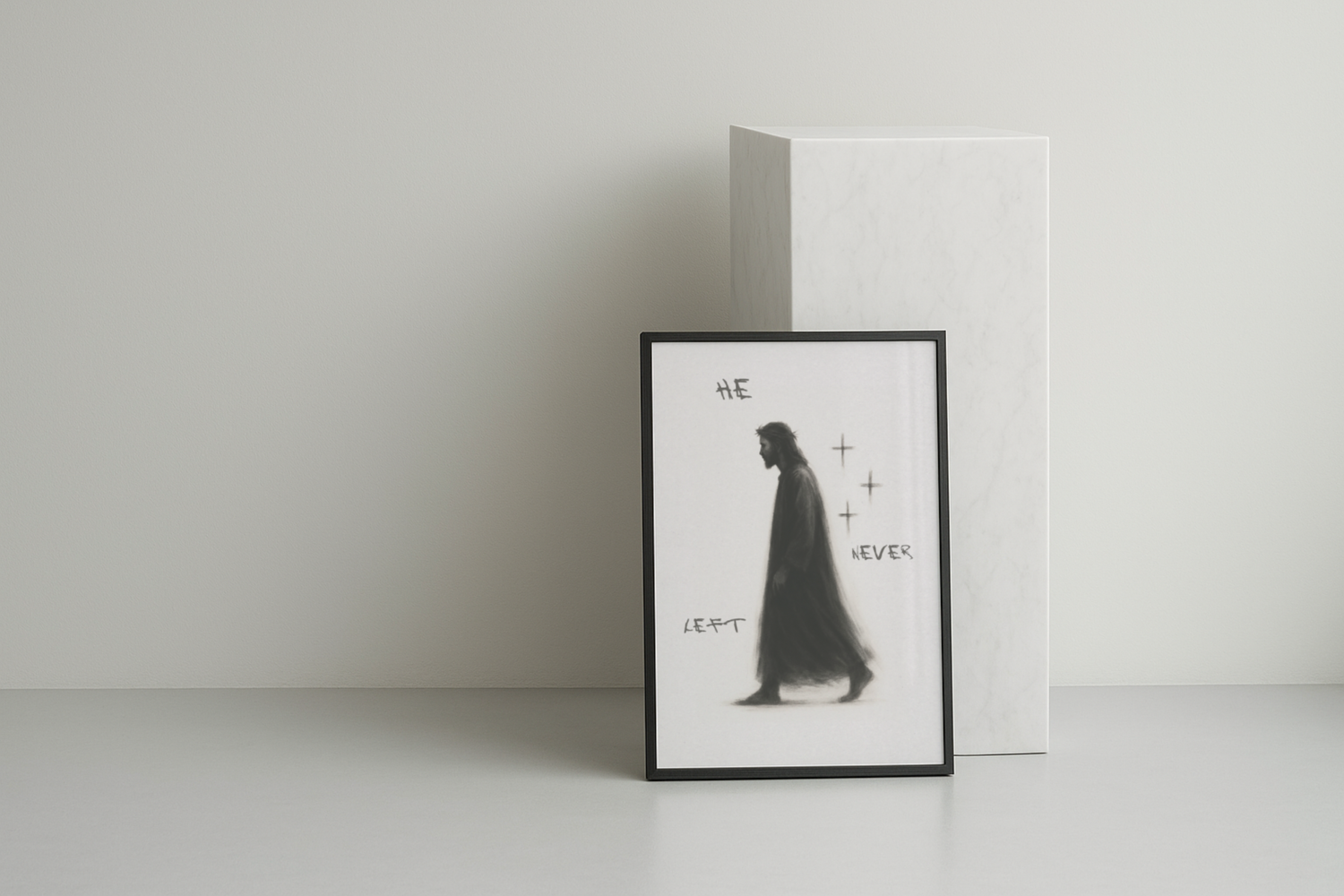 "He Never Left" Poster A2 Size leaning against a marble cube in a clean studio shot