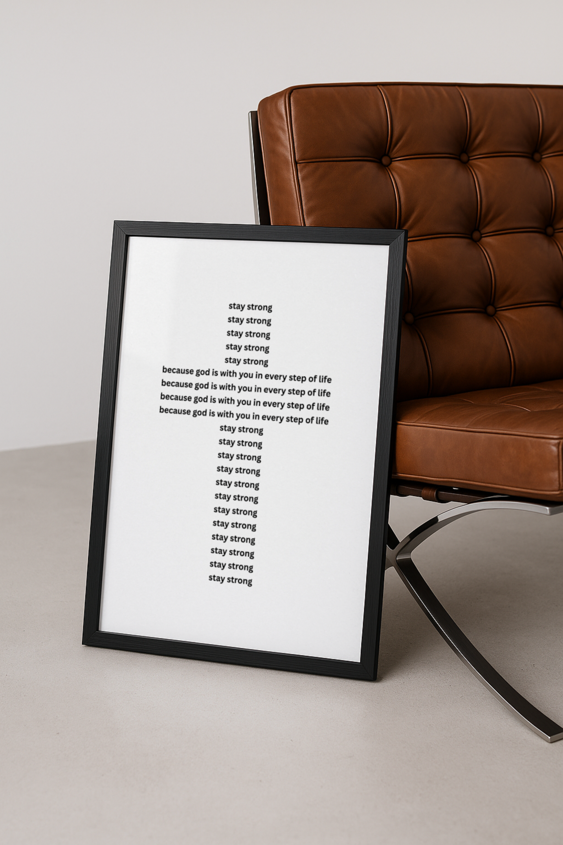 Stay Strong Image Leaning against designer chair in modern concrete studio